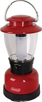 Front view of red Coleman LED lantern showing bail handle, clear lens, and control dial