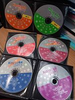 Five Karaoke Party discs in sleeves