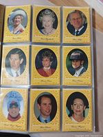 Nine yellow-border portrait cards in sleeve page
