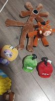 All five plush items laid out on floor