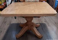 Top view of square wooden pedestal table