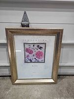 Front view of framed floral print