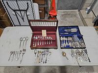Table overview showing three groups of flatware and serving pieces