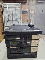 Full stack showing turntable on top of four Pioneer components