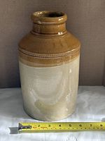 Full view of crock front showing two-tone glaze and shape