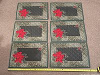 All six placemats laid out showing design and quantity