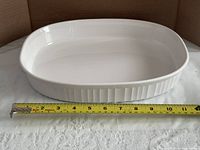 Top view showing full oval dish and length measurement