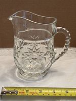 Side view showing full pitcher profile and pattern