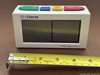 Front view with tape measure showing width