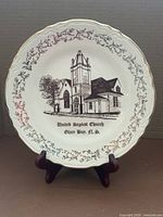 Front view showing church illustration, border and stand