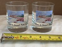 Front view of two glasses with tape measure for diameter