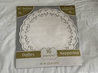 Front of one sealed 16-count 10-inch paper doily pack