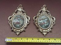 Pair of gilt frames with tape measure for scale