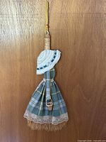 Full view of decorative tartan hand broom showing overall design and dimensions