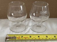 Front view of both Glenturret whisky glasses with ruler for scale