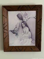 Front view of framed print on wall