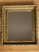 Front view showing full giltwood mirror