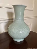 Full view of celadon porcelain vase front