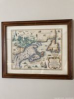 Framed hand-colored map close view showing map details