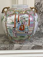 Front view of porcelain vase on stone hearth