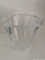 Front angled view showing faceted sides and thickness