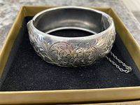 Front view of bracelet resting in box