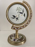 Full view of cloisonné stand with circular silk embroidery panel