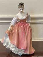 Front three-quarter view of Royal Doulton Fair Lady figurine