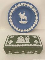 Blue RCMP centennial plate and sage green trinket box full view