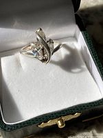 Front view of sterling silver ring in box