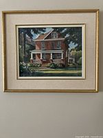 Framed watercolor close-up showing subject and signature area