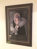 Full view of framed print on wall