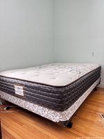 Sealy double mattress on box spring and metal frame