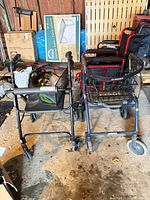 Two rollator walkers side by side in garage