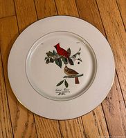 Full view of plate on wood floor