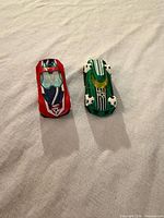 Top view showing both cars and soccer graphics