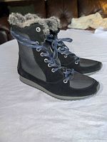 Side view showing boot profile, materials and sole