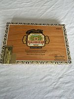 Top view showing crest, border trim, tax stamp