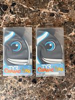 Front view of both packaged TYR CharacTYR swim caps