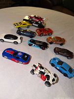 Angled view highlighting colours and details of each car