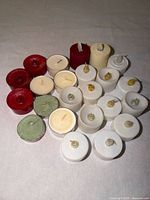 Top view of mixed votive and tealight candles