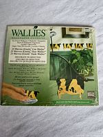 Front of sealed Wallies package displaying product name, cow design and quantity
