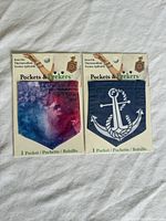 Front view of both sealed Pockets & Peekers packages showing designs