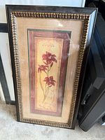 Front view of framed floral wall art showing full design