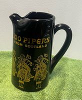 front view showing gold lettering and illustrations