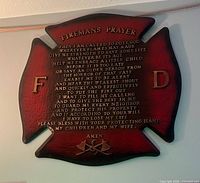 Front view of plaque showing full design and text