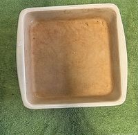 Top view of square stoneware baking dish interior