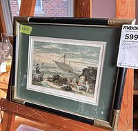 Front view of framed print on easel