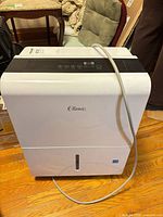 Front view of Classic MDCDP-45AEN1-BB0 dehumidifier showing control panel, body, and power cord