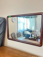 Full view of wall mirror hung horizontally